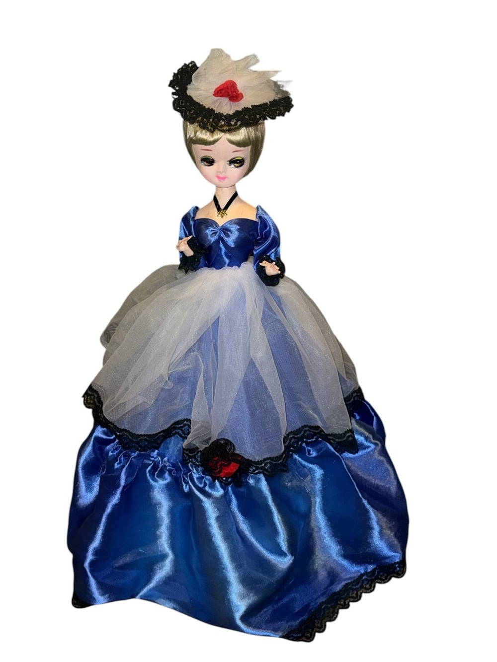 Vintage Bradley doll in blue dress